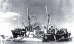 Discarging cargo from HELENA MODJESKA, after she ran ashore on the Goodwin Sands 12 September 1946